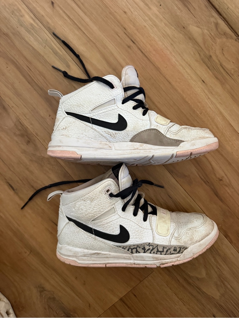 Nike Kids size 3 White and Black High-Top Sneakers with Pink Sole Accents